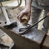 Fire Poker Applying the natural beeswax finish to a fire poker, forged by hand in the UK.