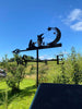 Clangers Weathervane A unique clangers weathervane on a summerhouse roof, with stunning summer blue sky.