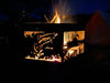 Hexagonal Firepit A Hexagonal Firepit by Black Fox Metalcraft Ltd glows warmly in the Scottish Highlands. Its laser-cut fish and wave design casts mesmerizing shadows, with flames and sparks dancing against the dark backdrop.