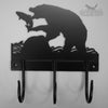 Bear Fishing Coat Hooks The Bear Fishing Coat Hooks by Black Fox Metalcraft Ltd feature a decorative laser-cut design of a bear catching a fish, finished in durable black powder coat, and come with three hand-forged hooks.