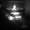 Black and white photo of laser cut firepit.