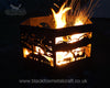 Hexagonal Firepit The Hexagonal Firepit by Black Fox Metalcraft Ltd features intricate laser-cut animal and landscape designs inspired by the Scottish Highlands, emitting bright flames and sparks.