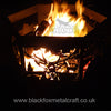 Hexagonal laser cut Firepit with Stag design shown.