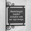Malamute Sign The Malamute Sign by Black Fox Metalcraft Ltd features a black metal bracket with scrollwork that elegantly holds a double-sided "Hand forged bracket included with any sign design" sign, ideal for displaying custom dog breed designs.