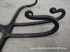 Garden Fork Hooks Close up photo of a set of hooks forged by hand from a reclaimed garden fork.