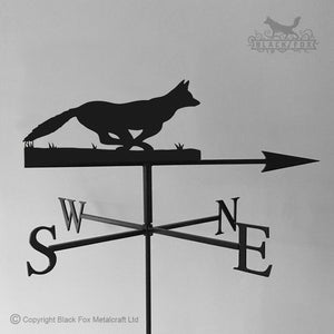 Fox running weathervane with traditional arrow.