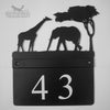Giraffe, Elephant and Acacia Tree House Sign The Giraffe, Elephant and Acacia Tree House Sign by Black Fox Metalcraft Ltd features silhouettes of a giraffe, elephant, and tree with a black powder coat finish and displays the number 43.