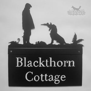 Hand painted metal house sign with Gun Dog design.