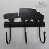 Land Rover and Trailer Coat Hooks The Land Rover and Trailer Coat Hooks from Black Fox Metalcraft Ltd feature a black metal wall hanger with three hand-forged hooks and a customizable Land Rover design cutout, finished in durable black powder coat.