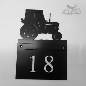 Hand painted metal house sign with Tractor design.