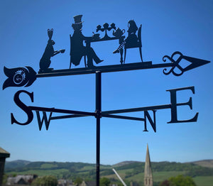 Alice in Wonderland weathervane depicting a scene from the mad Hatters tea party.
