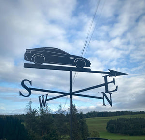 Aston martin Weathervane photo with cloudy sky background