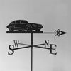 The E Type Jag Weathervane (Series 3) by Black Fox Metalcraft Ltd features a car silhouette atop black metal with S, W, N, and E directional letters, all set against a plain gray background.