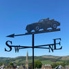 Jaguar XK40 weathervane, featuring a driver and passenger, photographed in the Scottish Borders with beautiful summer sky background.