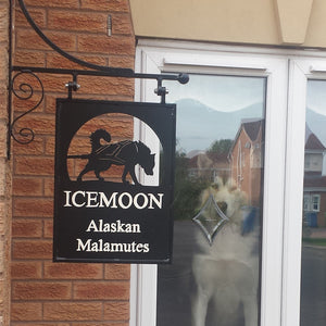 Hanging sign with Malamute Pulling