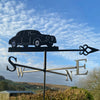 Jaguar Mark 2 weathervane with blue sky and fluffy cloud background.