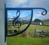 Hanging Basket Bracket featuring a treble clef design - ideal gift for a musician.