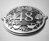 The Metal Art house number Signs by Black Fox Metalcraft Ltd feature a hand drawn, intricately laser cut design.