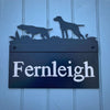 The Pointers House Sign by Black Fox Metalcraft Ltd features the word "Fernleigh" with two dog silhouettes on a blue background.