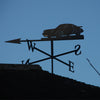 Porsche weathervane, personalised with number plate painted by hand. Blue Sky background.