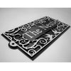 Add charm to your entryway with Black Fox Metalcraft Ltd’s Metal Art Address Signs—a rectangular sign featuring cut-out scrollwork based around the theme of Swallows and vines.
