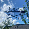 Triathlon weathervane photographed on a summer house roof, ideal gift for sportspeople!