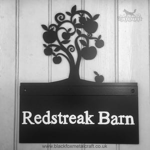 Metal house sign with Apple tree design.