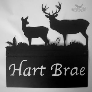 Hand painted metal house sign with Deer design.