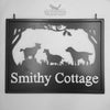 Custom Hanging sign featuring two goats and a dog.