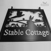 Hanging sign featuring a hare and Pheasant in the countryside.