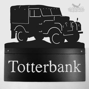 Hand painted metal house sign with Landrover  design.