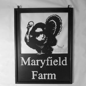 Laser cut turkey hanging farm sign.